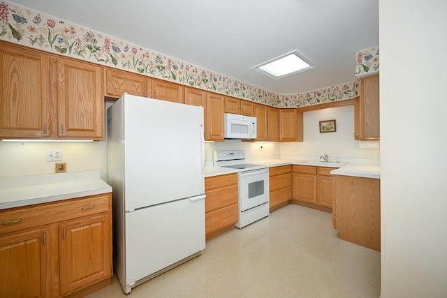 4248 Saratoga Ave Unit 308, Downers Grove, IL 60515 - kitchen with a sink, light countertops, white appliances, wallpapered walls, and light floors