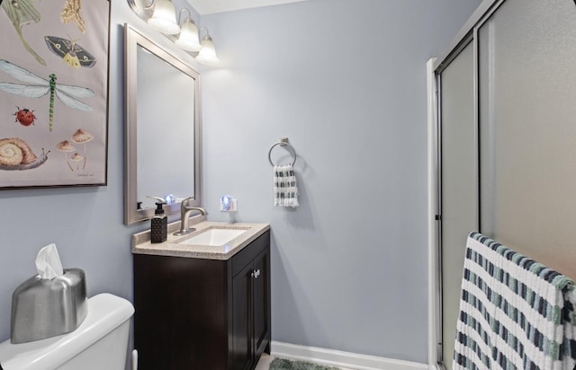 11001 Deblin Ln Unit 205, Oak Lawn, IL 60453 - bathroom featuring toilet, vanity, baseboards, and a shower stall