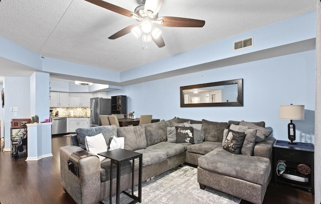 11001 Deblin Ln Unit 205, Oak Lawn, IL 60453 - living room with a textured ceiling, visible vents, a ceiling fan, and wood finished floors