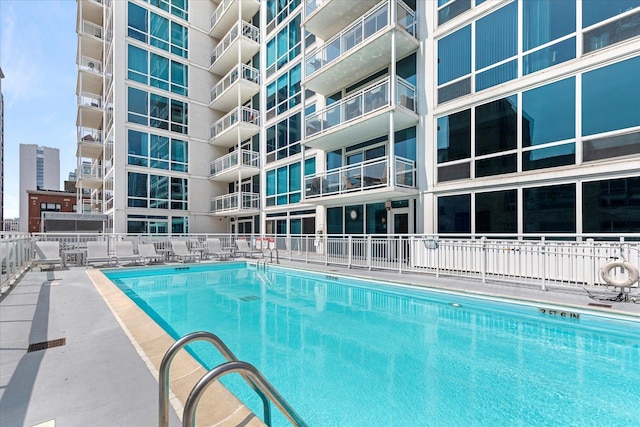 community pool with fence