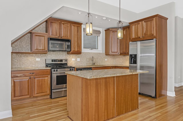 1459 W Melrose St Unit 1N, Chicago, IL 60657 - kitchen with stainless steel appliances, light wood-type flooring, light stone counters, brown cabinetry, and recessed lighting