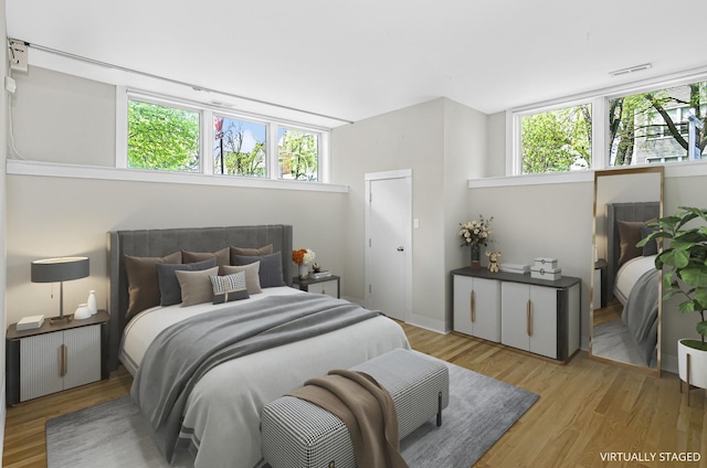 1459 W Melrose St Unit 1N, Chicago, IL 60657 - bedroom with light wood-type flooring