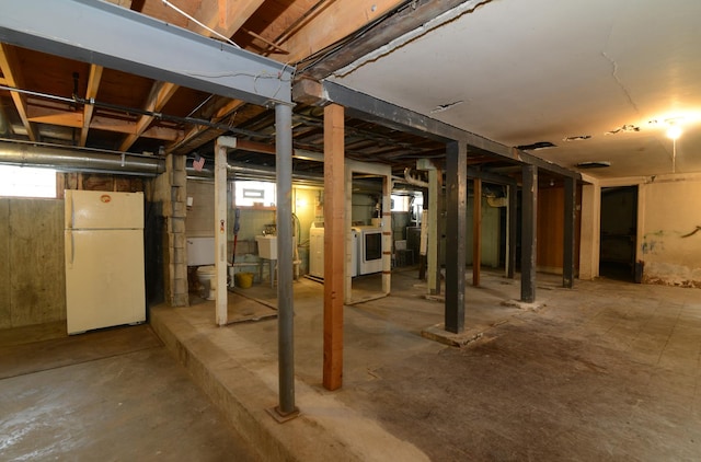 3902 Rose Ave, Western Springs, IL 60558 - basement featuring freestanding refrigerator and washer / dryer