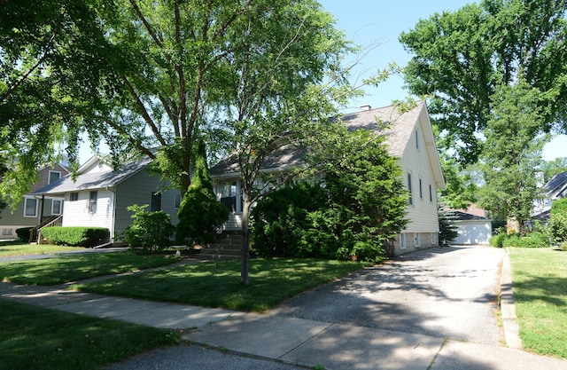 3902 Rose Ave, Western Springs, IL 60558 - view of property hidden behind natural elements featuring a front yard and a garage