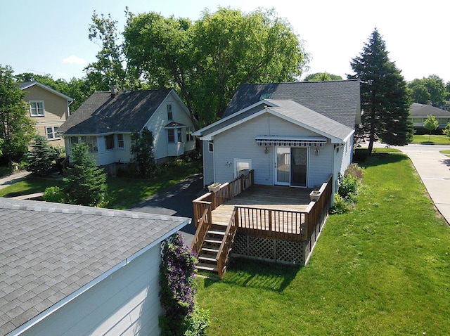 3902 Rose Ave, Western Springs, IL 60558 - back of house with a lawn, a shingled roof, and a wooden deck