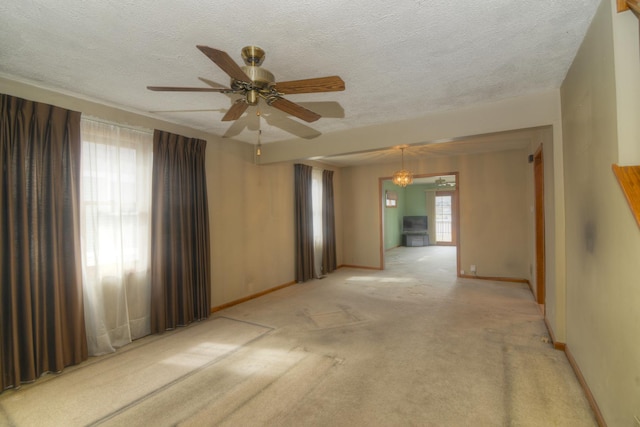 3902 Rose Ave, Western Springs, IL 60558 - unfurnished room featuring light colored carpet, ceiling fan, and a textured ceiling