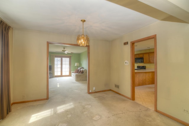 3902 Rose Ave, Western Springs, IL 60558 - empty room with a chandelier, light colored carpet, and ceiling fan