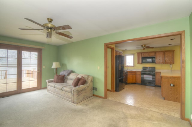3902 Rose Ave, Western Springs, IL 60558 - living area featuring a ceiling fan and light colored carpet