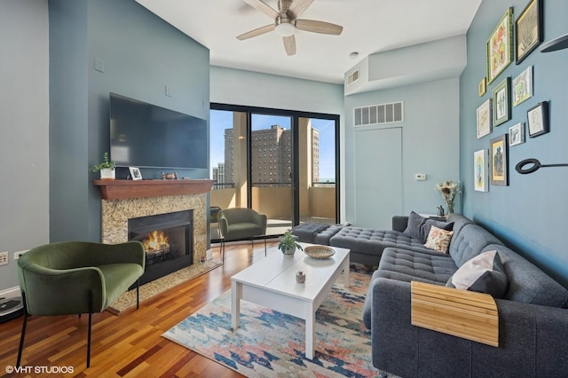 1464 S Michigan Ave Unit 1401, Chicago, IL 60605 - living area with wood finished floors, ceiling fan, and a premium fireplace