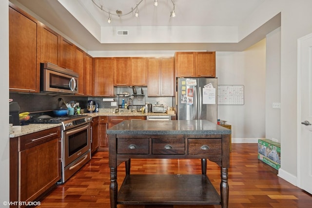 1464 S Michigan Ave Unit 1401, Chicago, IL 60605 - kitchen with appliances with stainless steel finishes, dark wood-type flooring, and decorative backsplash