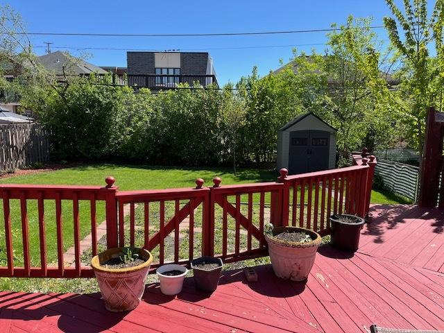 1911 N 73rd Ave N, Elmwood Park, IL 60707 - wooden deck with a shed