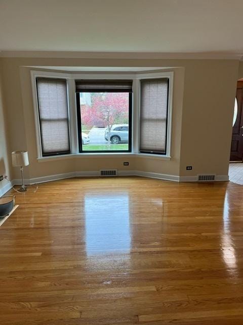 1911 N 73rd Ave N, Elmwood Park, IL 60707 - empty room featuring light wood-style floors and baseboards