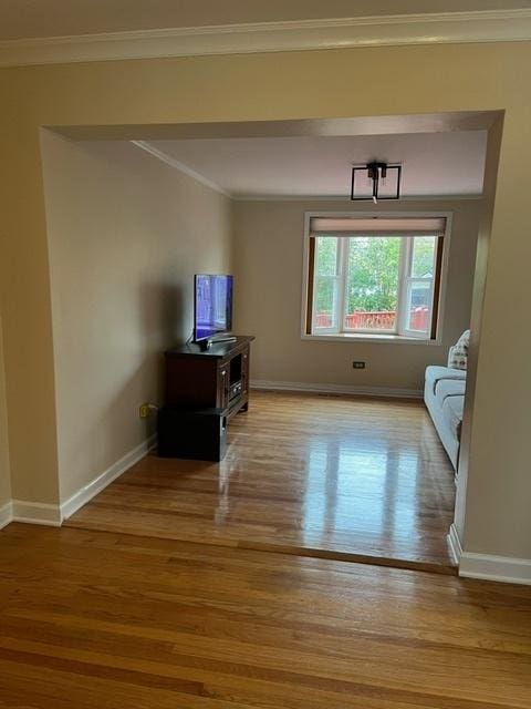 1911 N 73rd Ave N, Elmwood Park, IL 60707 - living room featuring wood finished floors and crown molding