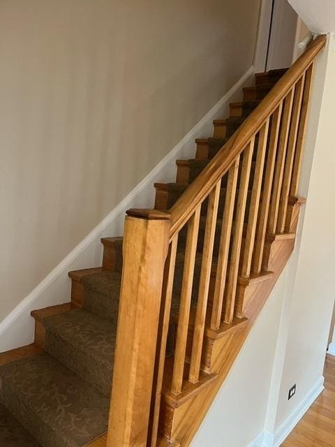 1911 N 73rd Ave N, Elmwood Park, IL 60707 - stairs featuring wood finished floors and baseboards