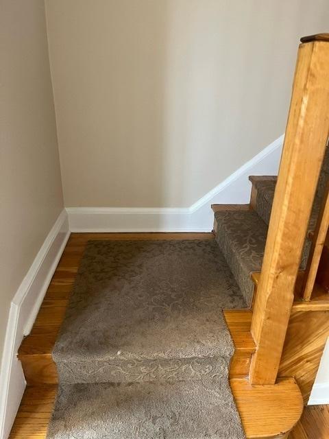 1911 N 73rd Ave N, Elmwood Park, IL 60707 - stairway with wood finished floors and baseboards
