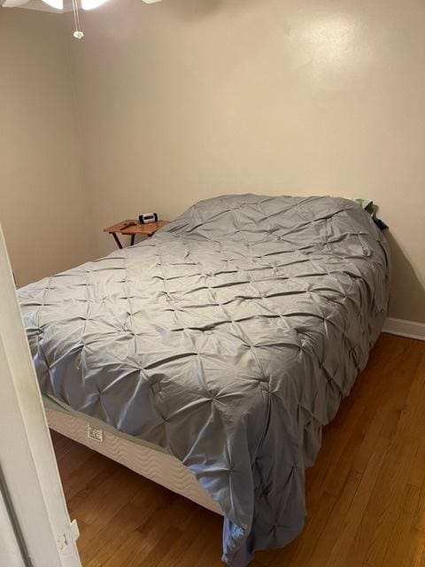 1911 N 73rd Ave N, Elmwood Park, IL 60707 - bedroom with wood finished floors and ceiling fan