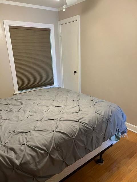 1911 N 73rd Ave N, Elmwood Park, IL 60707 - bedroom with wood finished floors and ornamental molding