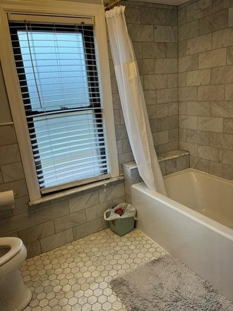 1911 N 73rd Ave N, Elmwood Park, IL 60707 - bathroom featuring tile patterned flooring, shower / bath combo with shower curtain, and healthy amount of natural light