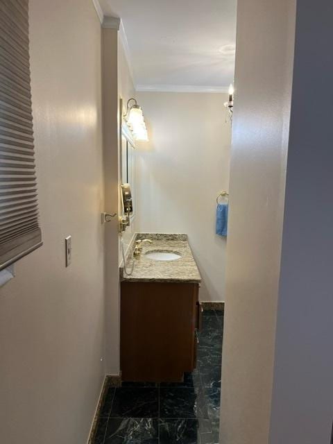 1911 N 73rd Ave N, Elmwood Park, IL 60707 - bathroom featuring vanity, crown molding, and marble finish floors