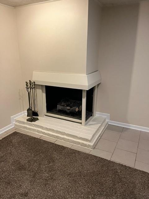 1911 N 73rd Ave N, Elmwood Park, IL 60707 - detailed view of baseboards and a fireplace with raised hearth