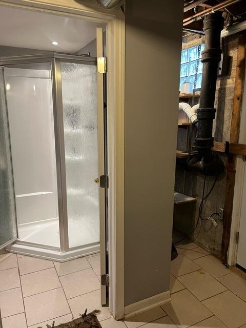 1911 N 73rd Ave N, Elmwood Park, IL 60707 - full bath with a shower stall and tile patterned flooring