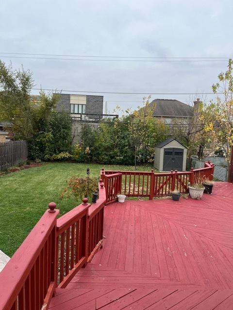 1911 N 73rd Ave N, Elmwood Park, IL 60707 - deck featuring a storage unit