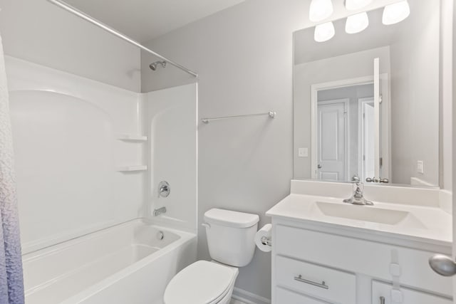 bathroom with vanity, toilet, and tub / shower combination