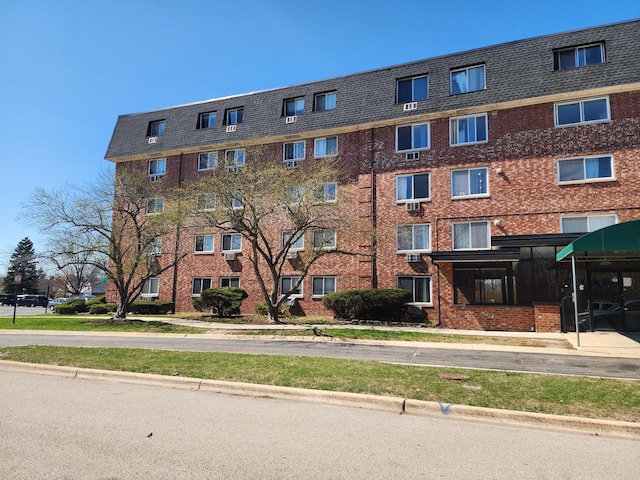 5011 S Valley Ln Unit 409, Streamwood, IL 60107 - view of apartment building / complex