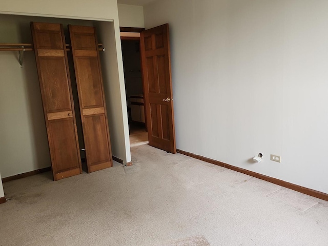 5011 S Valley Ln Unit 409, Streamwood, IL 60107 - unfurnished bedroom with light carpet and a closet