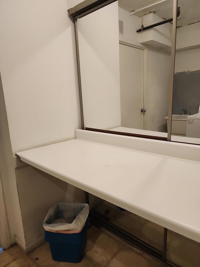 5011 S Valley Ln Unit 409, Streamwood, IL 60107 - bathroom with tile patterned floors