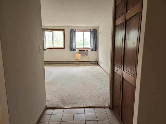 5011 S Valley Ln Unit 409, Streamwood, IL 60107 - unfurnished bedroom featuring light colored carpet and light tile patterned floors