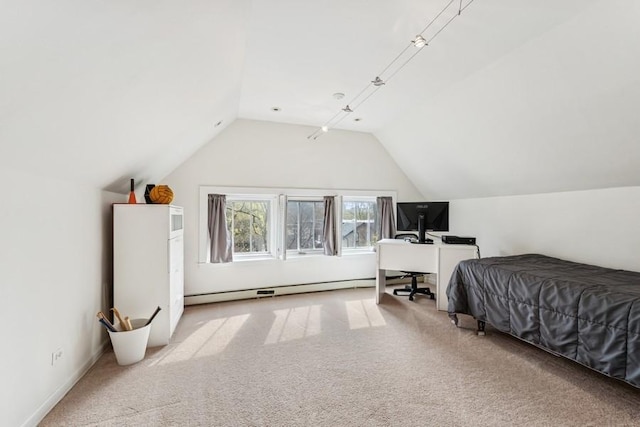 bedroom featuring vaulted ceiling and carpet flooring