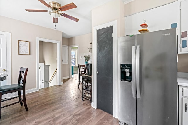 123 W York Ave, West Chicago, IL 60185 - kitchen with stainless steel fridge with ice dispenser, baseboards, a ceiling fan, and wood finished floors