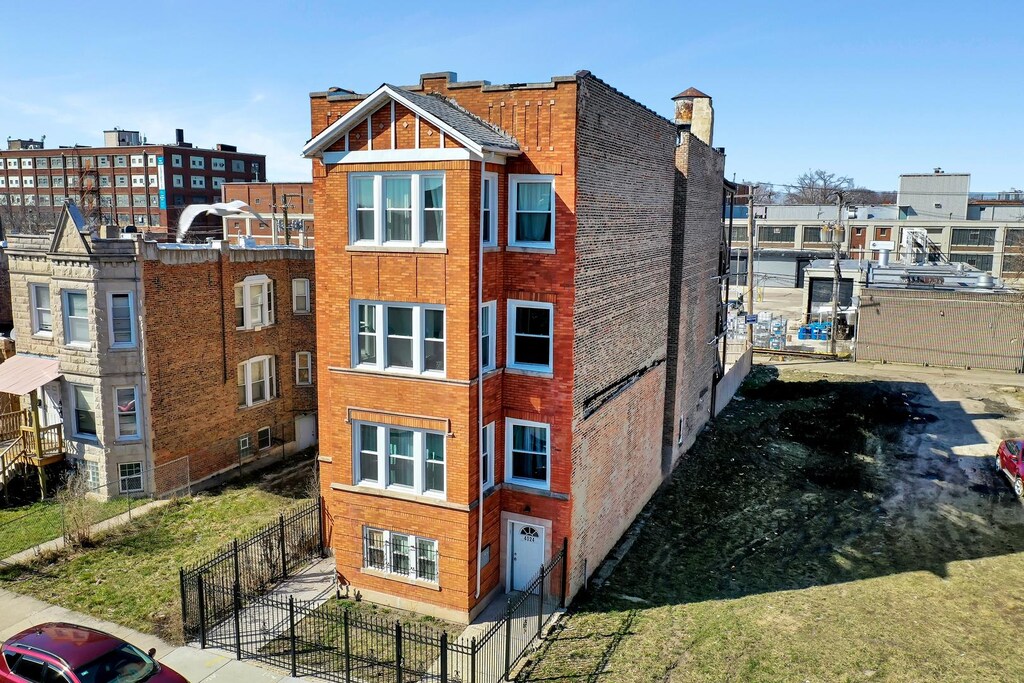 4024 W Grenshaw St, Chicago, IL 60624 - view of building exterior featuring fence