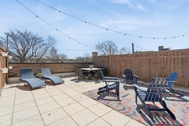 4845 N Damen Ave Unit 3S, Chicago, IL 60625 - view of patio / terrace featuring fence and outdoor dining area