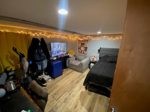 bedroom featuring wood finished floors