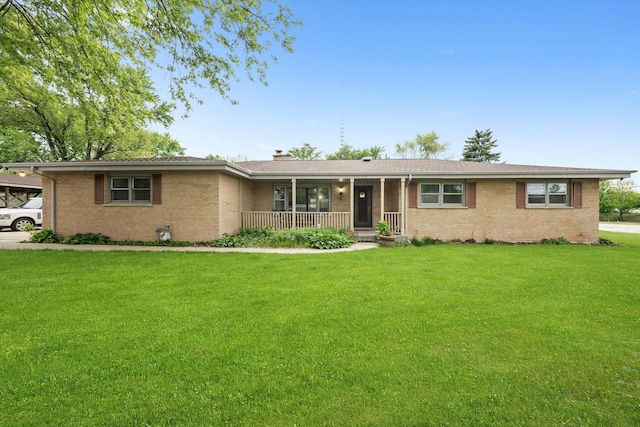 910 Sarah Ln, Aurora, IL 60502 - ranch-style home with a porch, brick siding, a front yard, and a chimney