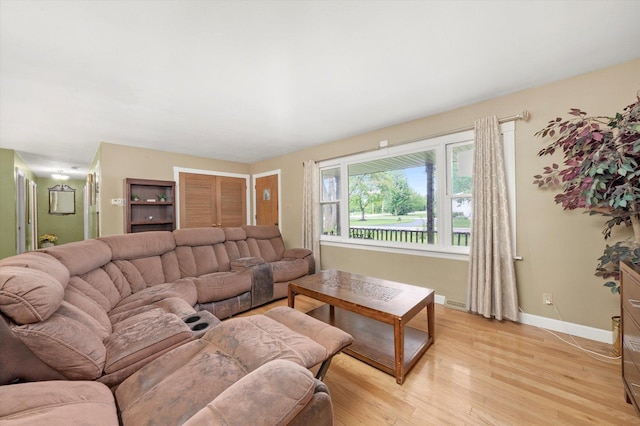 910 Sarah Ln, Aurora, IL 60502 - living room with baseboards and light wood finished floors