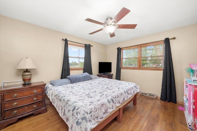 910 Sarah Ln, Aurora, IL 60502 - bedroom featuring light wood-type flooring and a ceiling fan