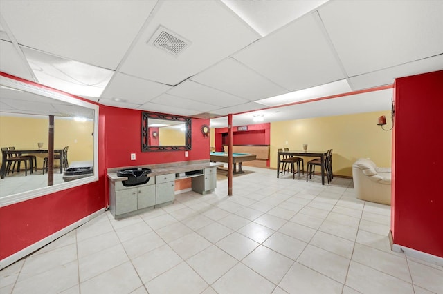 910 Sarah Ln, Aurora, IL 60502 - bar featuring a drop ceiling, baseboards, and light tile patterned floors