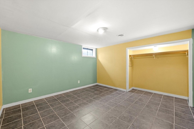910 Sarah Ln, Aurora, IL 60502 - unfurnished bedroom featuring a closet and baseboards