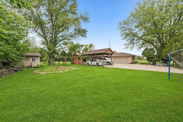 910 Sarah Ln, Aurora, IL 60502 - view of green lawn featuring concrete driveway
