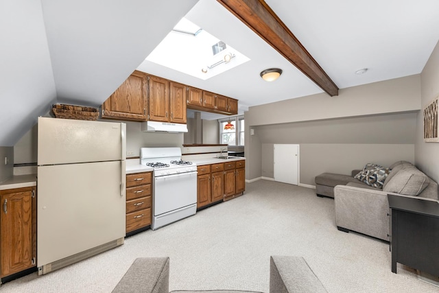kitchen featuring white appliances, light colored carpet, under cabinet range hood, and brown cabinetry