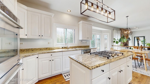 1531 Walnut St, Western Springs, IL 60558 - dining space featuring light wood-style floors, ceiling fan, stairway, and a chandelier