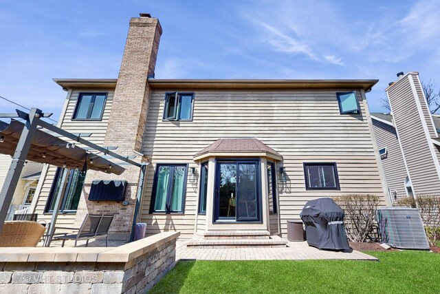 1531 Walnut St, Western Springs, IL 60558 - back of house featuring central air condition unit, a chimney, a pergola, a patio area, and a yard