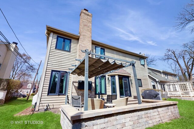 1531 Walnut St, Western Springs, IL 60558 - rear view of property featuring a chimney, a pergola, and a lawn
