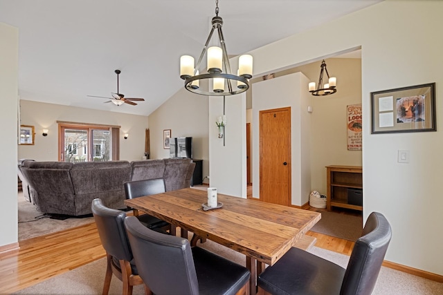 1496 Trailwood Dr, Crystal Lake, IL 60014 - dining area with a chandelier, a ceiling fan, light wood-style floors, and vaulted ceiling