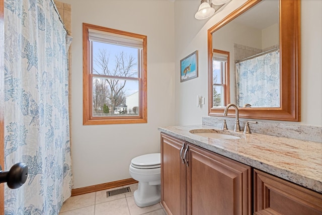 1496 Trailwood Dr, Crystal Lake, IL 60014 - full bath with tile patterned floors, toilet, vanity, baseboards, and a shower with curtain