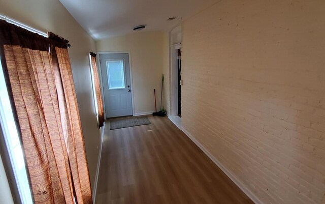 4627 W Schubert Ave, Chicago, IL 60639 - hallway featuring baseboards and wood finished floors