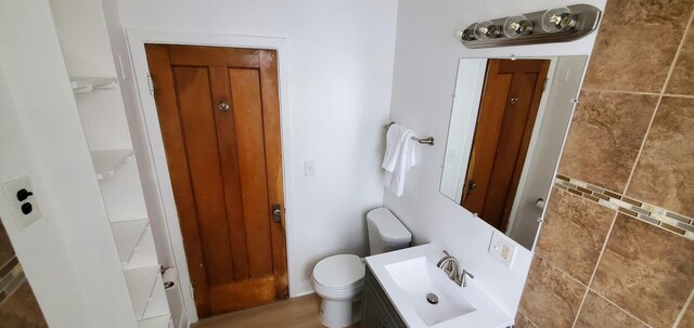 4627 W Schubert Ave, Chicago, IL 60639 - bathroom with toilet and vanity